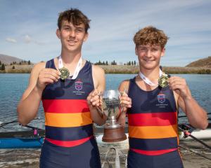 Matthew O'Meara (left) and Angus Loe celebrate winning the boys under-18 double sculls at Maadi...