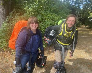 Arriving in Geraldine from Methven on their trusty electric unicycles are Robert Beck (left) and...