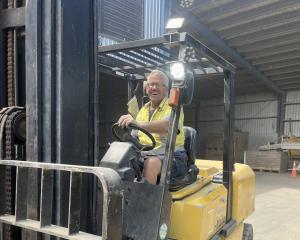 Fred Goodall has a blast shifting onions on a forklift. PHOTOS: SUPPLIED