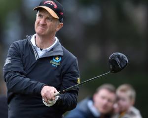St Clair Saints golfer Tony Giles watches his drive during the pennant final against the Otago...