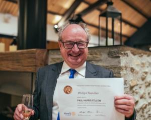 Scene’s chief news hound Philip ‘Scoop’ Chandler has been presented a Paul Harris Fellowship by...