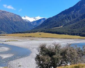 Four mountains reveal themselves as you advance up the Matukituki Valley. Photo: Clare Fraser