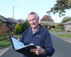 Retirement Villages Residents Association national president Brian Peat looks over documents at...