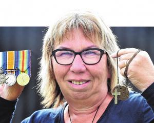 Cindy Kennedy with the medals awarded to her great-uncle. Photo: Peter McIntosh