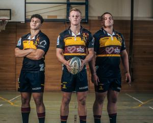 Highlanders (from left) Jake Te Hiwi, Sam Gilbert and Ethan de Groot model their heritage jerseys...