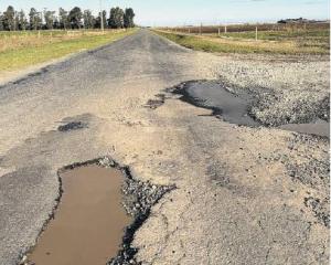 A giant pothole on Chertsey Kyle Rd is an unmarked danger for motorists. Photo: Supplied