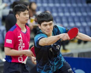 South Korean Army table tennis team representatives (from left) Yechan Yang, 22, Gihun Lee, 22,...