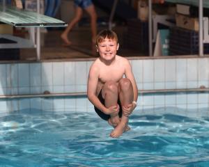 Frank Cayford, 9, of Dunedin, makes the most of his time at the Moana Pool complex’s dive pool...