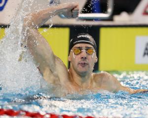 Kane Follows celebrates after swimming an Olympic qualifying time and a national record at the...