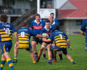 Owaka captain Tyler Hammer charges into the Toko defence during the Southern Region club rugby...