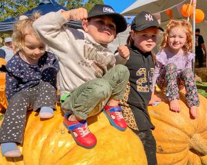 The giant pumpkins made for popular photo opportunities with the crowd. Photo: Geoff Sloan