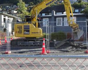 A digger at a roadworks site in Frankton Rd rips out work that had been completed as part of the...