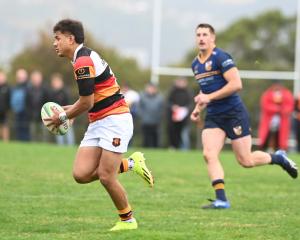 Zingari-Richmond centre, Tama Apineru, looks for an attacking opportunity against Dunedin at...