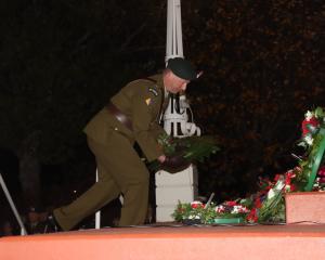 ​​​​​​​Royal New Zealand Infrantry Regiment 2nd lieutenant Paul McCullough lays a wreath at the...