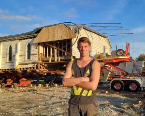 King House Removals labourer Jake Willis is part of the team that has loaded the former Lumsden...