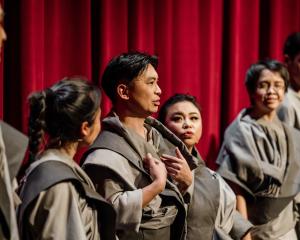 Nathan Joe, centre, with the cast and band from Scenes from a Yellow Peril. Photo: Andi Crown