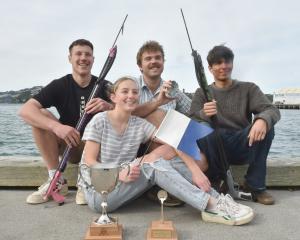 Displaying the silverware up for grabs at the Otago Student Spearfishing and Hunting Club...