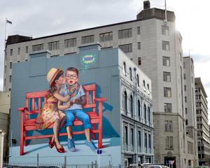 Love is in the Air has been removed nine years after it was painted on the side of Dunedin’s...