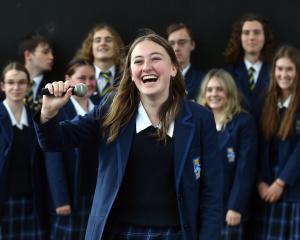 Taieri College pupil Bridey Dalton, 17, doing a microphone check for her grandmother Suzanne...