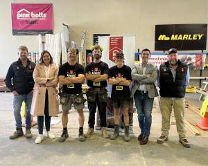 Celebrating a successful event are (from left) New Zealand Certified Builders (NZCB) regional Mid...