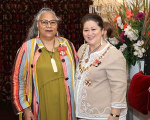 Philippa Laufiso, of Dunedin, with Governor-General Dame Cindy Kiro, after being presented with...