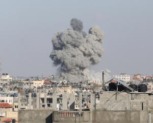 Smoke rises over Rafah after an Israeli strike on the southern Gaza city. Photo: Reuters 