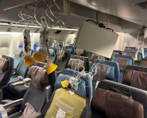 The interior of Singapore Airline flight SQ321 is pictured after an emergency landing at Bangkok...