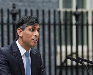 British Prime Minister Rishi Sunak delivers a speech calling for a general election outside...