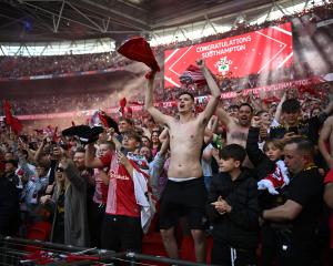 Southampton fans celebrate after winning the Championship Play-Off final against Leeds at Wembley...