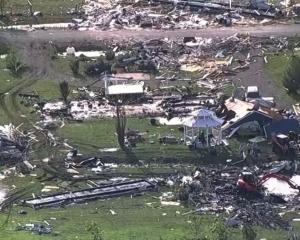 Wreckage is strewn across a tornado-hit property in Valley View, Texas, in a still image from...
