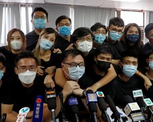 Attending a news conference in&nbsp;Hong&nbsp;Kong in July 2020 are young&nbsp;democrats from the...