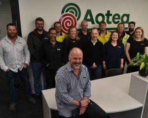 Aotea Electric Southern general manager Warren Taylor (front), with some of his team, says the...