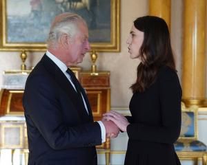 King Charles and Dame Jacinda Ardern. PHOTO: AP