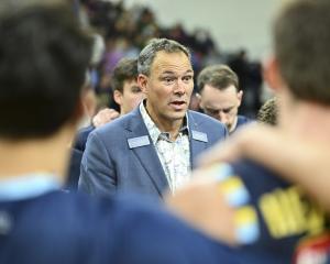 Nuggets coach Brent Matehaere talks to his players during the game against the Saints at the...