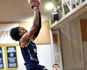 Nuggets No 4 Kimani Lawrence lines up a slam-dunk for his side against the Auckland Tuatara at...