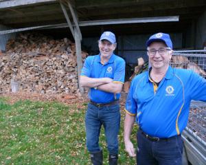 Balclutha Lions Club members Ivan Martin (left) and Rodney Jopson get ready to prepare a delivery...