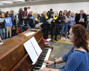 Community Choir in full song in the library for Night of the Arts in Invercargill last night.