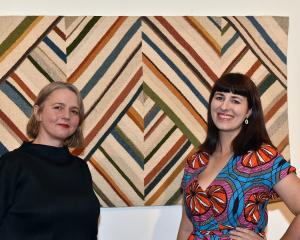 Curators Elle Lou August (left) and Jane Groufsky in front of Margery Blackman’s From Aramoana....