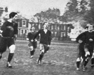 Baker scores a try for Dunedin against Union on North Ground. — Otago Witness, 3.6.1924 