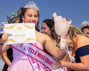 Soraya Ahfook, 10, is awarded the Little Miss Charity title at the Little Miss Aotearoa NZ...
