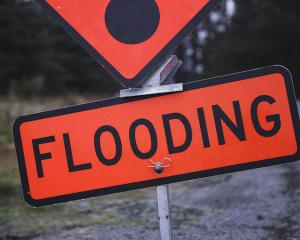 Flood sign near Rakaia Gorge. Photo: RNZ