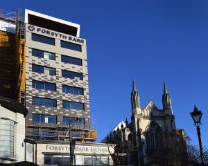 Forsyth Barr House in Dunedin’s Octagon nears completion. Staff hope to return to the building by...