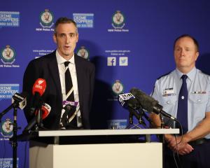 Detective Superintendent Peter Faux, Organised Crime Squad Commander (left) together with...