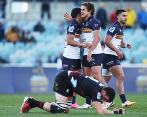 Brumbies players celebrate their victory over the Crusaders. Photo: Getty