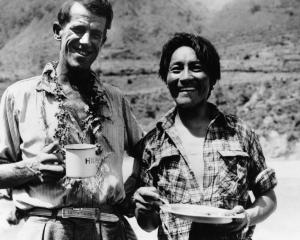 Edmund Hillary and Tenzing Norgay enjoy a snack. Photo: Getty Images