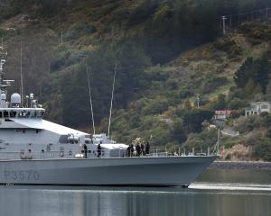 Inshore patrol vessel HMNZS Taupō enters the Otago Harbour Basin yesterday. On board are junior...