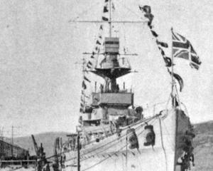 HMS Dunedin dressed to mark the anniversary of King George V’s Accession to the Throne. — Otago...