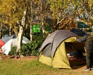 Homeless people living in tents at the edge of the Oval in Dunedin were visited by housing...
