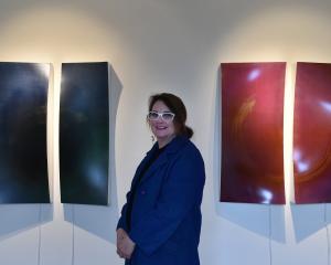 Larisse Hall enjoys seeing her works change as the light in a room changes such as (left) Hope...
