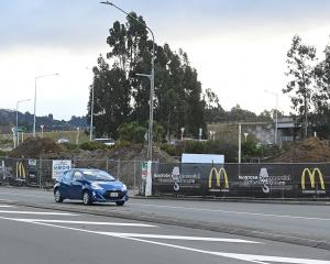 Cars travel along Main South Rd heading into Green Island, past the site of McDonald’s new...